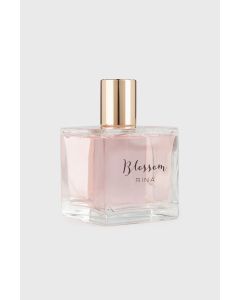 Model wears Blossom Rina Perfume