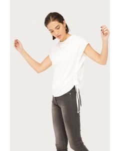 Model wears Plain blouse with adjsuting straps
