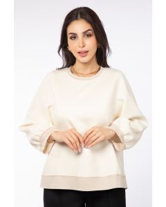 بلوزة نسائية بتفاصيل لون متباين