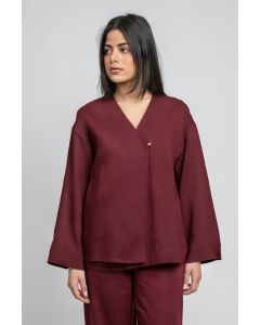 توب بياقة V بتصميم لف وزر أمامي