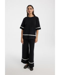 بنطلون نسائي محبوك بتفاصيل متباينة