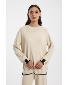 كنزة نسائية محبوكة بأطراف متباينة